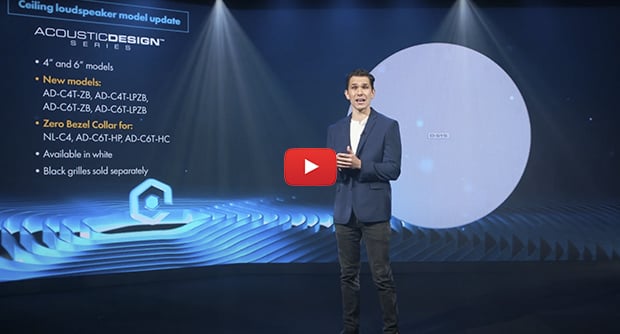 Video thumbnail of a man on a stage presenting New Zero-Bezel Design: AcousticDesign Series Ceiling Loudspeakers