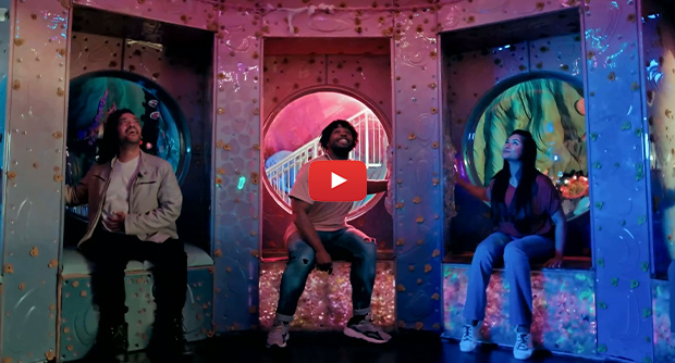 Video thumbnail of three seated individuals fascinated by something above them