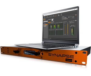 Angled laptop displaying audio software sitting on top of a Synapse D16Mio