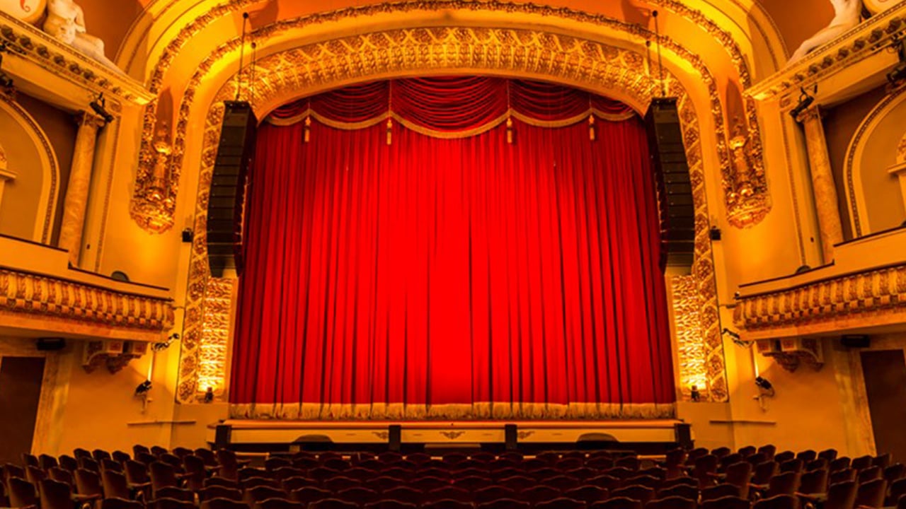 View of the Royal Theater stage with red curtains