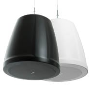 Front left-angled view of two QSC pendant mounted loudspeakers in back and white color