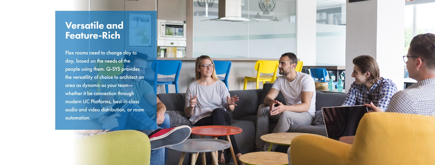 A group of individuals talking in a flex space