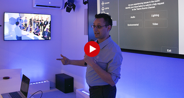 Video thumbnail of a man giving a presentation in a Q-SYS Immersive Collaboration Room