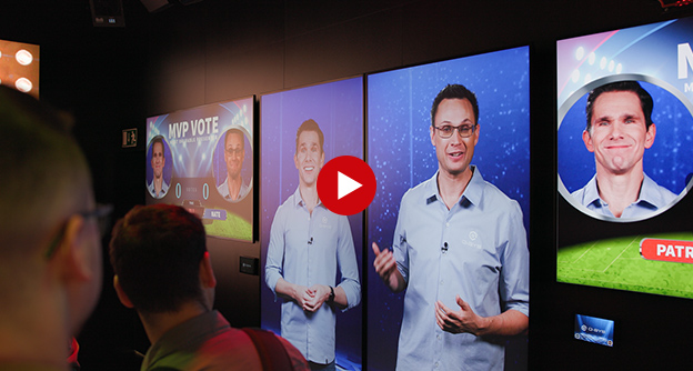 Vide Thumbnail of a Q-SYS Entertainment & Hospitality Room displaying employees presenting on the screens