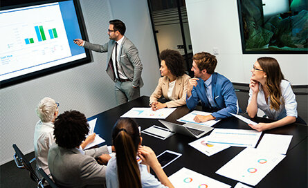 Image of people in a conference room