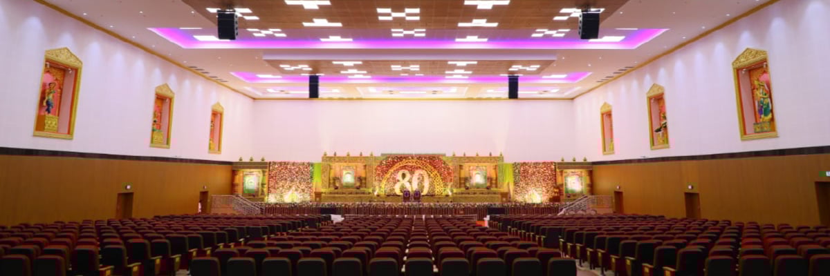 View of the state at the end of a auditorium at Adhiparasakthi College of Arts and Sciences