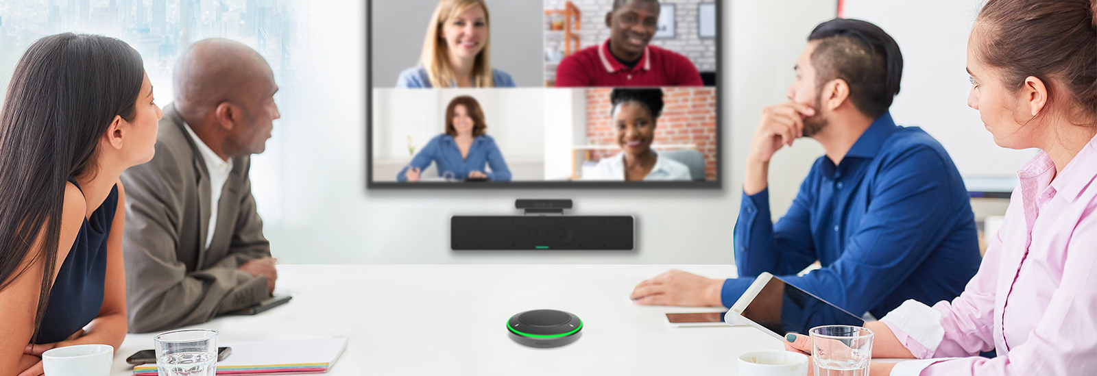 Image of people video chatting in conference room