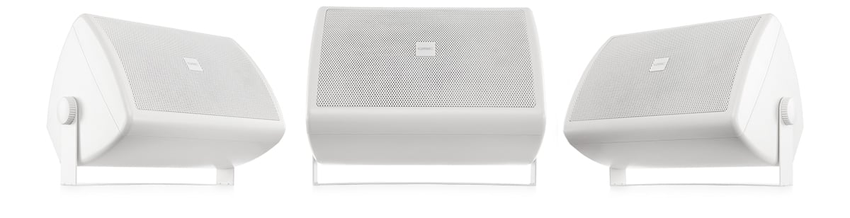 Hero front and angled view of a white in color AC-S6T loudspeaker with mount