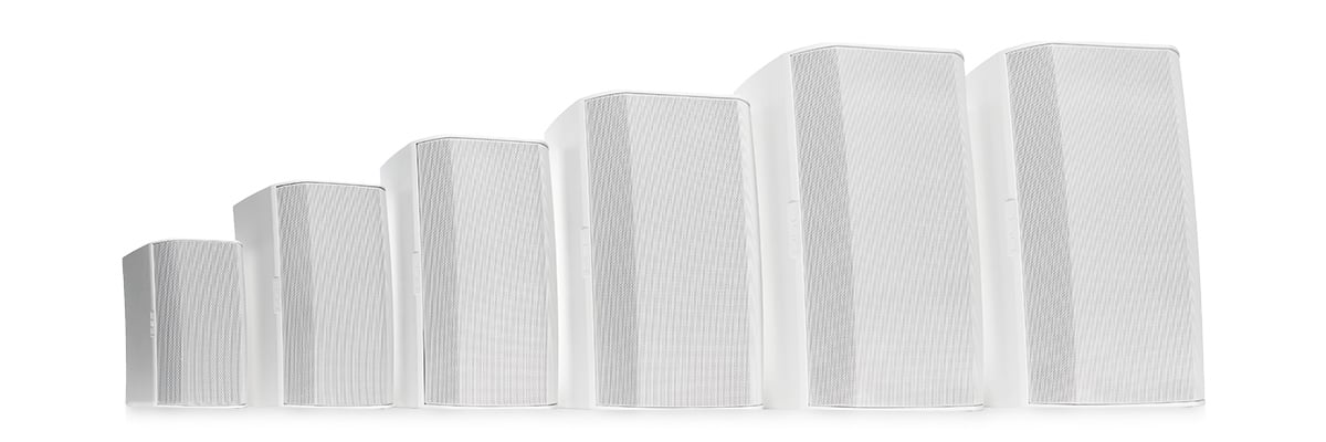 Hero group shot of the white in color AcousticDesign Series Premium loudspeakers ordered by height and size
